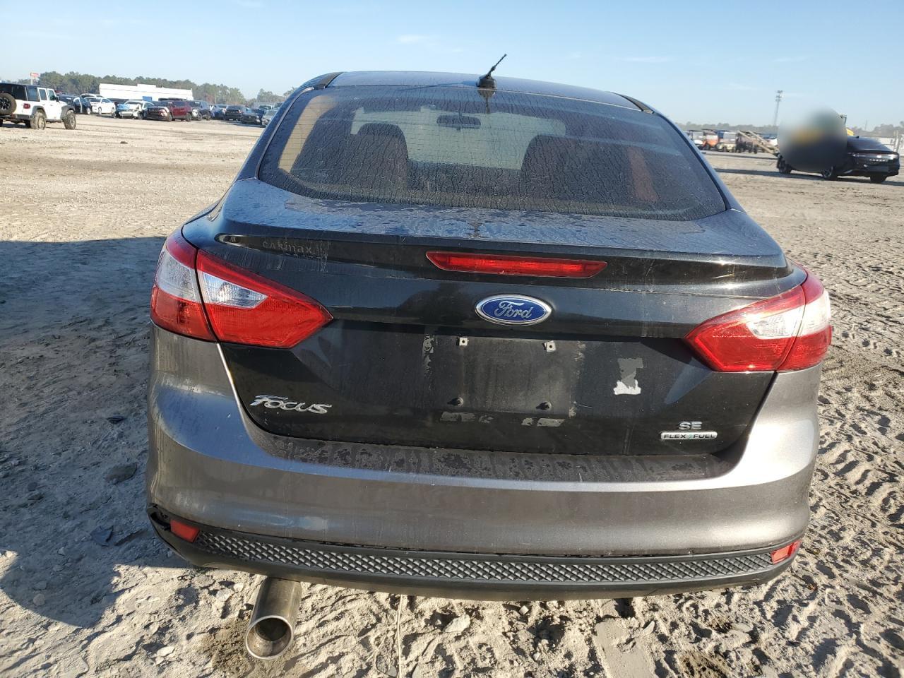 2014 Ford Focus VIN 1FADP3F23EL229159 Copart auction photo, front end / minor dent/scratches damage thumbnail 6