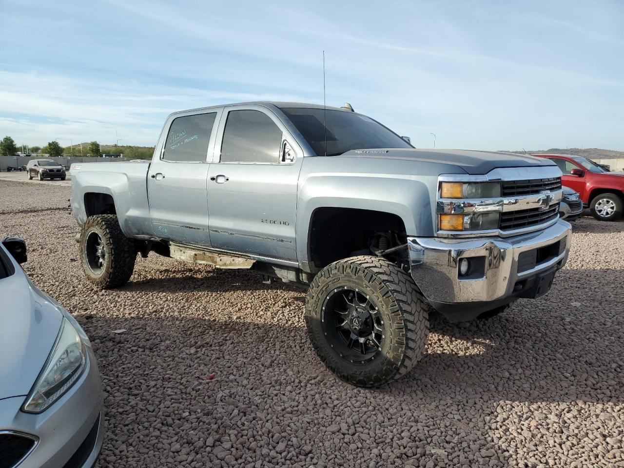 2015 Chevrolet Silverado VIN 1GC1KWE84FF568340 Copart auction photo, side / rear end damage thumbnail 4