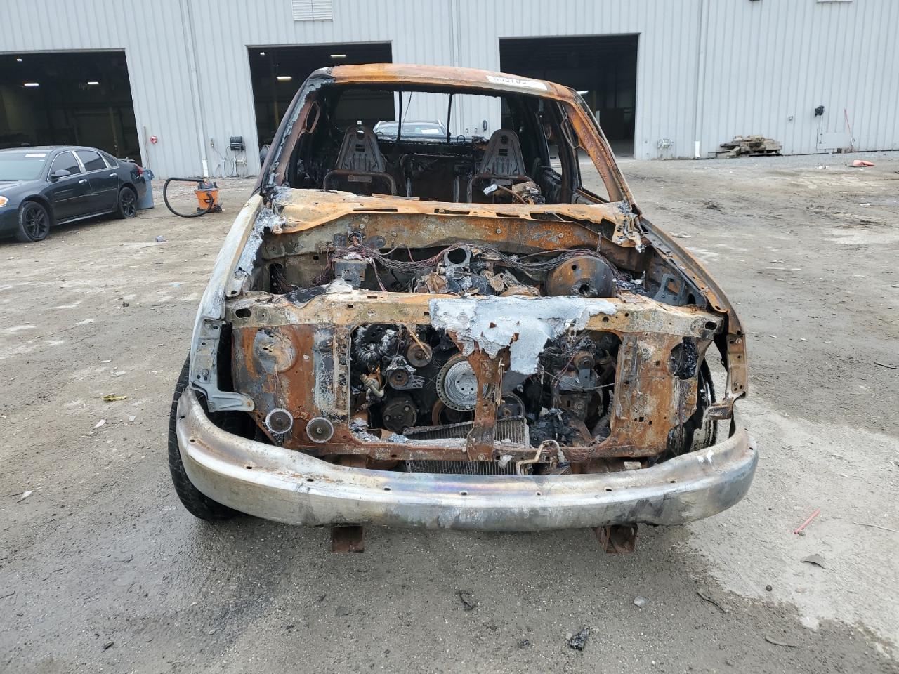 2003 Ford F-150 VIN 1FTRW07663KA14817 Copart auction photo, burn damage thumbnail 5