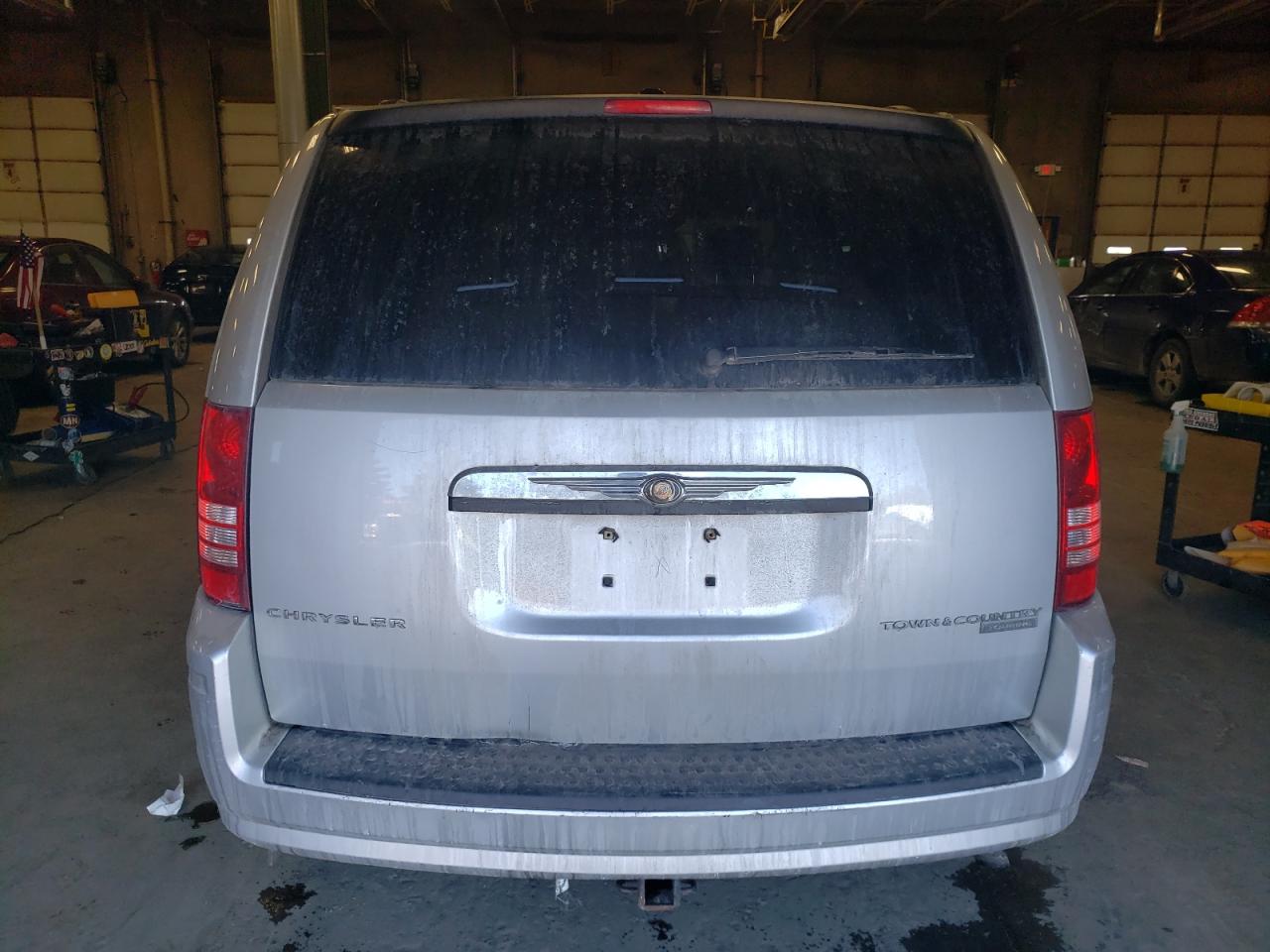 2010 Chrysler Town & Country VIN 2A4RR5D19AR306919 Copart auction photo, front end damage thumbnail 6