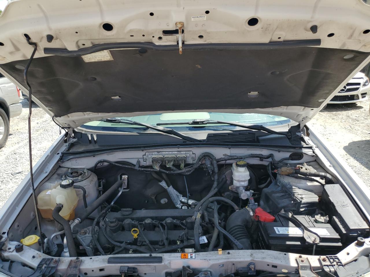 2010 Ford Escape VIN 1FMCU0C74AKA31201 Copart auction photo, front end damage thumbnail 11