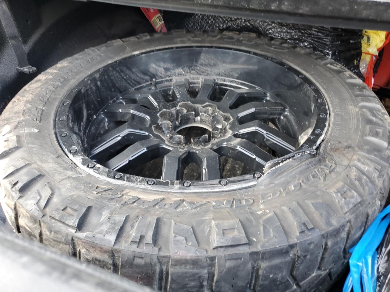 2019 RAM 1500 VIN 1C6SRFJT3KN698322 Copart auction photo, undercarriage / minor dent/scratches damage thumbnail 12