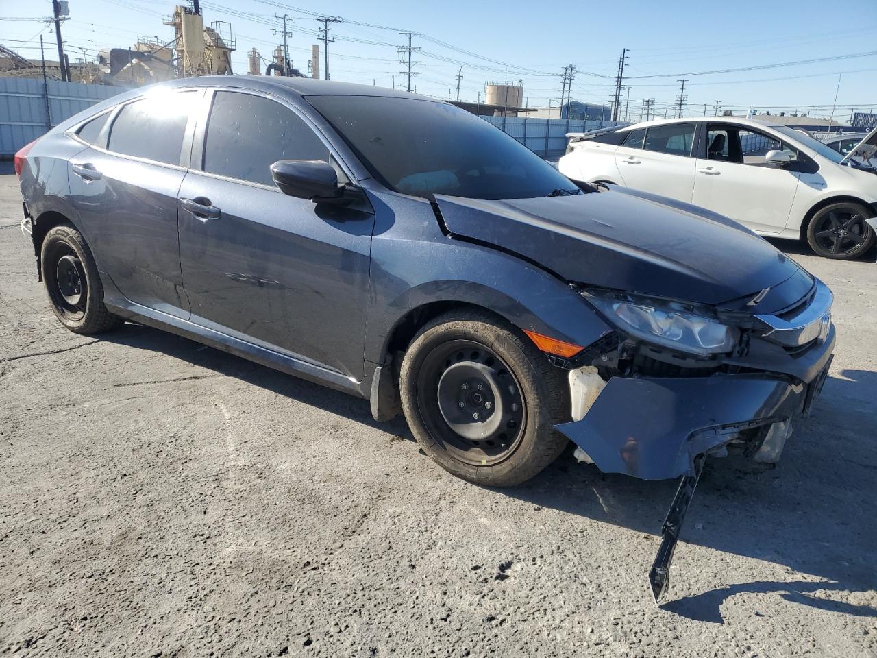 2017 Honda Civic VIN 19XFC2F55HE205655 Copart auction photo, all over damage thumbnail 4