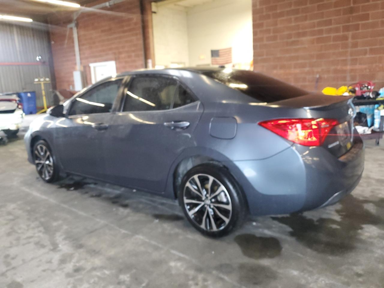 2017 Toyota Corolla VIN 5YFBURHEXHP621068 Copart auction photo, side damage thumbnail 2