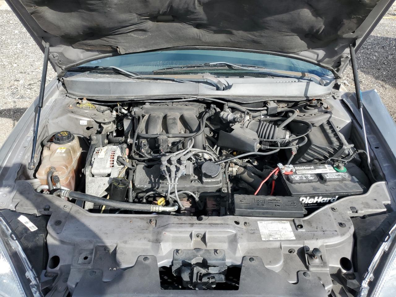 2006 Ford Taurus VIN 1FAFP53UX6A261856 Copart auction photo, all over / mechanical damage thumbnail 12