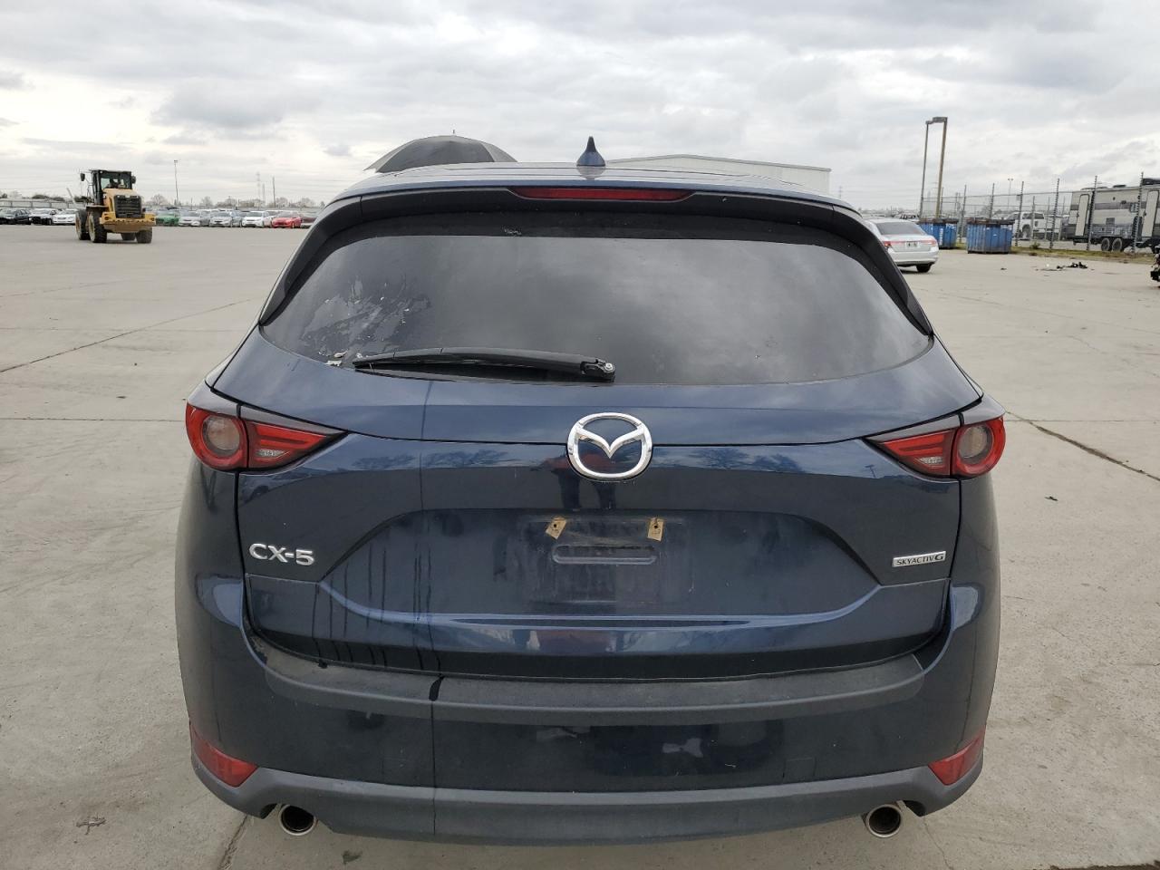 2021 Mazda CX-5 VIN JM3KFADM8M1321415 Copart auction photo, front end / side damage thumbnail 6