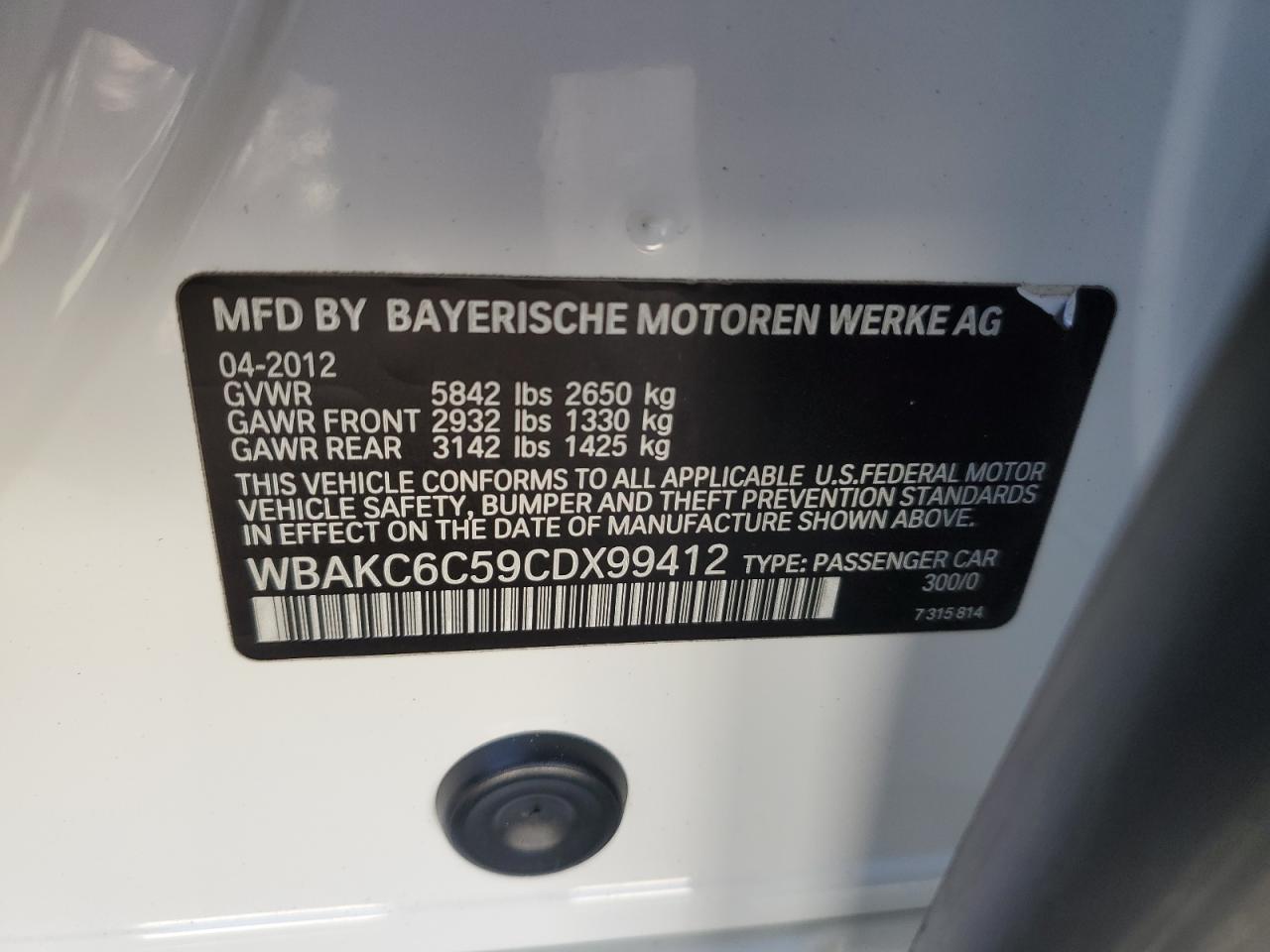 2012 BMW 7er VIN WBAKC6C59CDX99412 Copart auction photo, front end / minor dent/scratches damage thumbnail 12