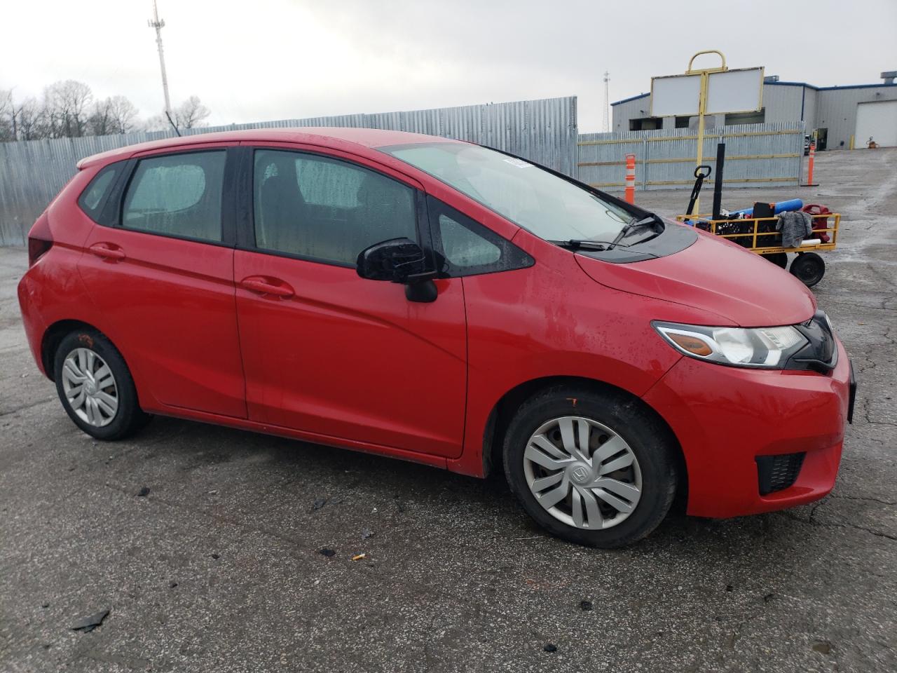 2015 Honda Fit VIN 3HGGK5H57FM777210 Copart auction photo, side / hail damage thumbnail 4
