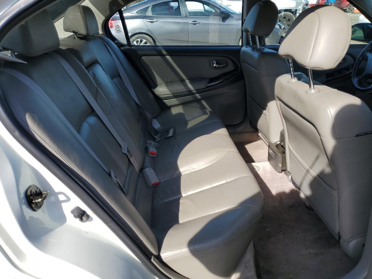 2000 Infiniti I VIN JNKCA31A6YT123457 Copart auction photo, all over damage thumbnail 10