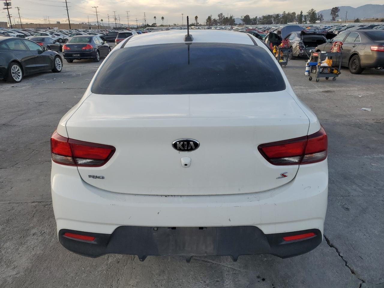 2019 KIA Rio VIN 3KPA24AB6KE214488 Copart auction photo, side / rear end damage thumbnail 6