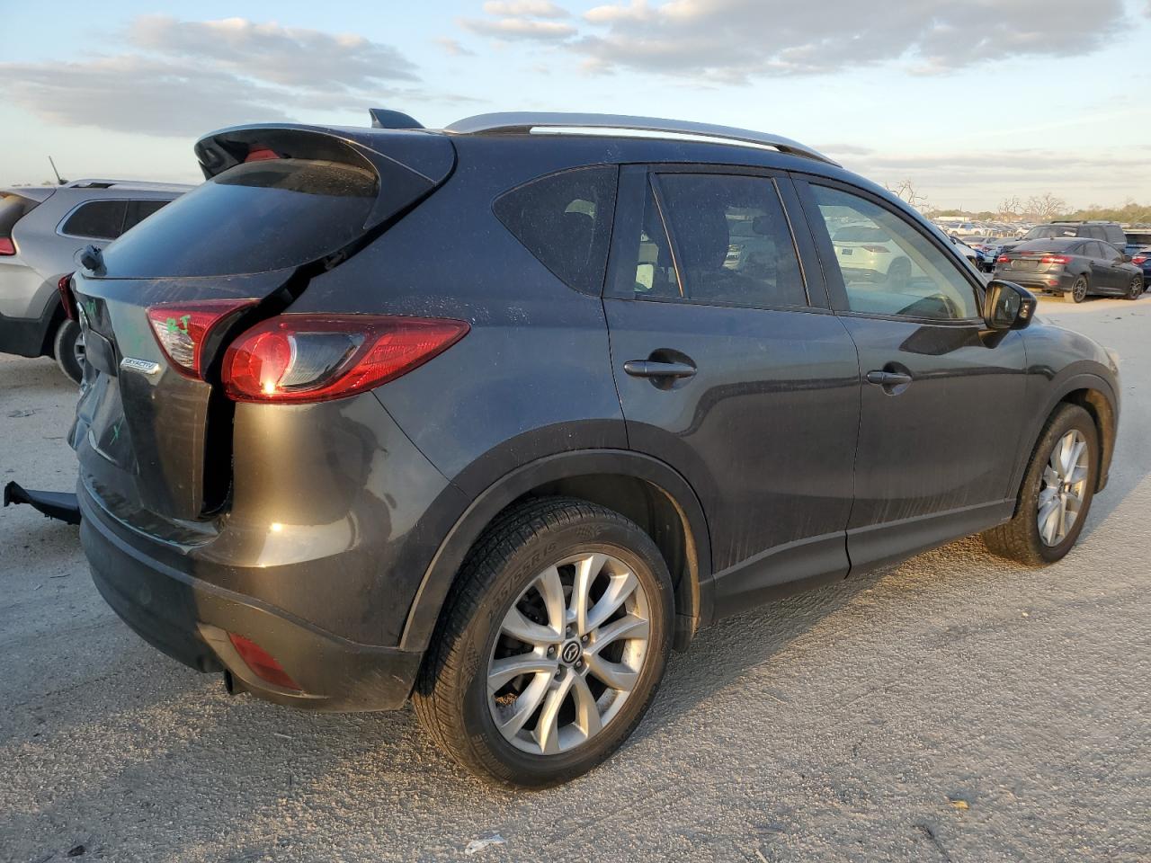 2014 Mazda CX-5 VIN JM3KE2DY0E0303039 Copart auction photo, rear end / minor dent/scratches damage thumbnail 3