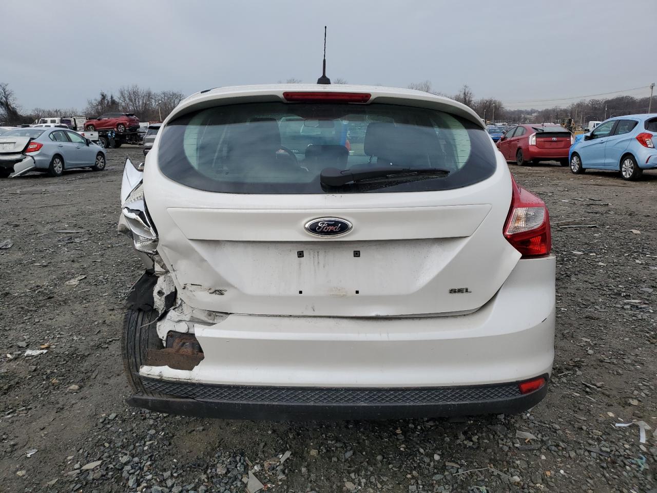 2012 Ford Focus VIN 1FAHP3M21CL288714 Copart auction photo, front end / rear end damage thumbnail 6