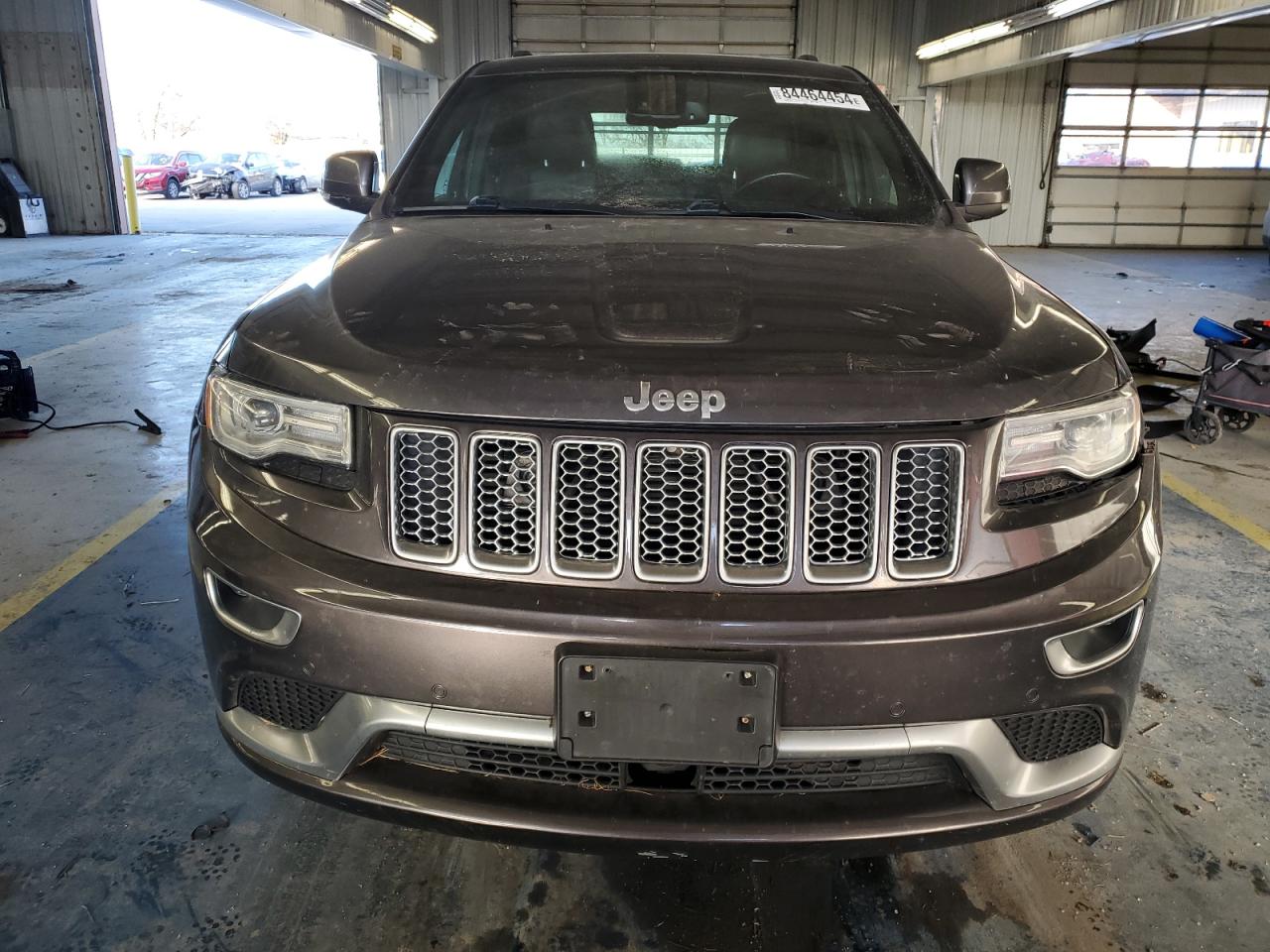 2015 Jeep Grand Cherokee VIN 1C4RJFJM9FC711776 Copart auction photo, rear end / side damage thumbnail 5