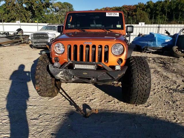 2011 Jeep Wrangler VIN 1J4BA3H19BL518107 Copart auction photo, front end damage thumbnail 11