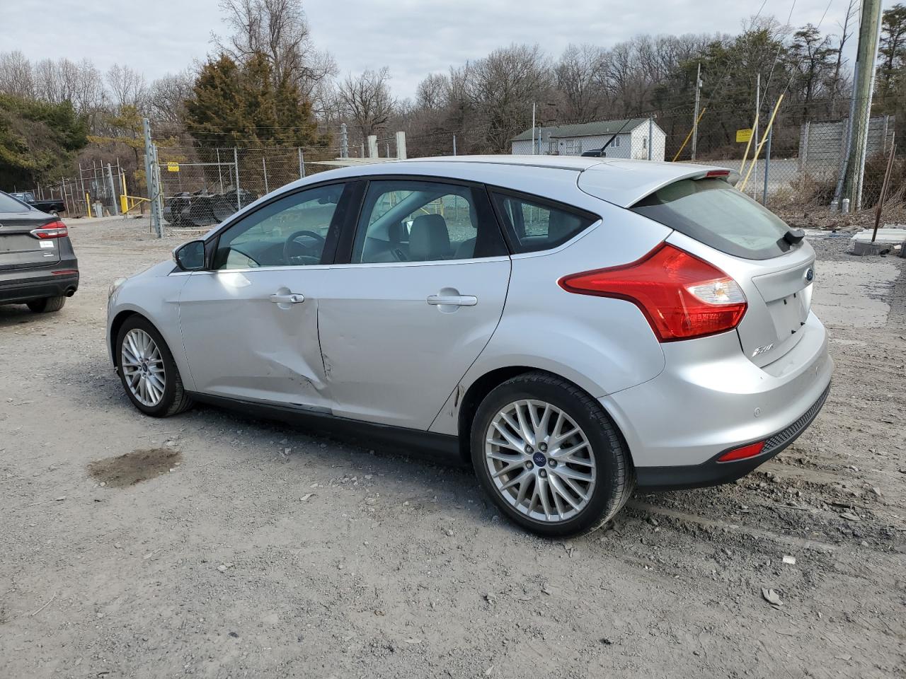 2012 Ford Focus VIN 1FAHP3M26CL134449 Copart auction photo, side damage thumbnail 2