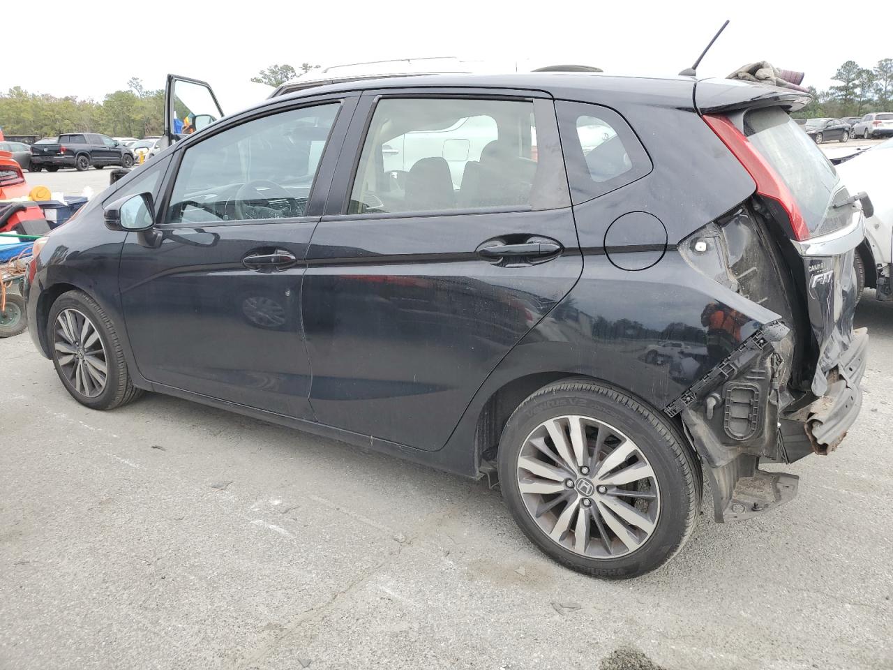 2016 Honda Fit VIN JHMGK5H73GX028267 Copart auction photo, rear end damage thumbnail 2