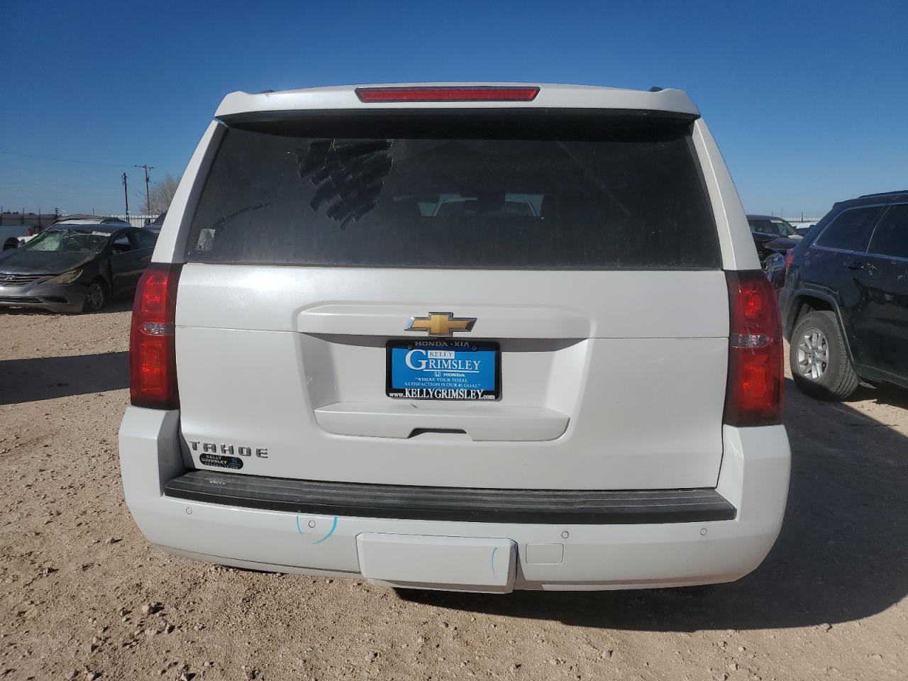2017 Chevrolet Tahoe VIN 1GNSCBKCXHR388677 Copart auction photo, vandalism / all over damage thumbnail 6