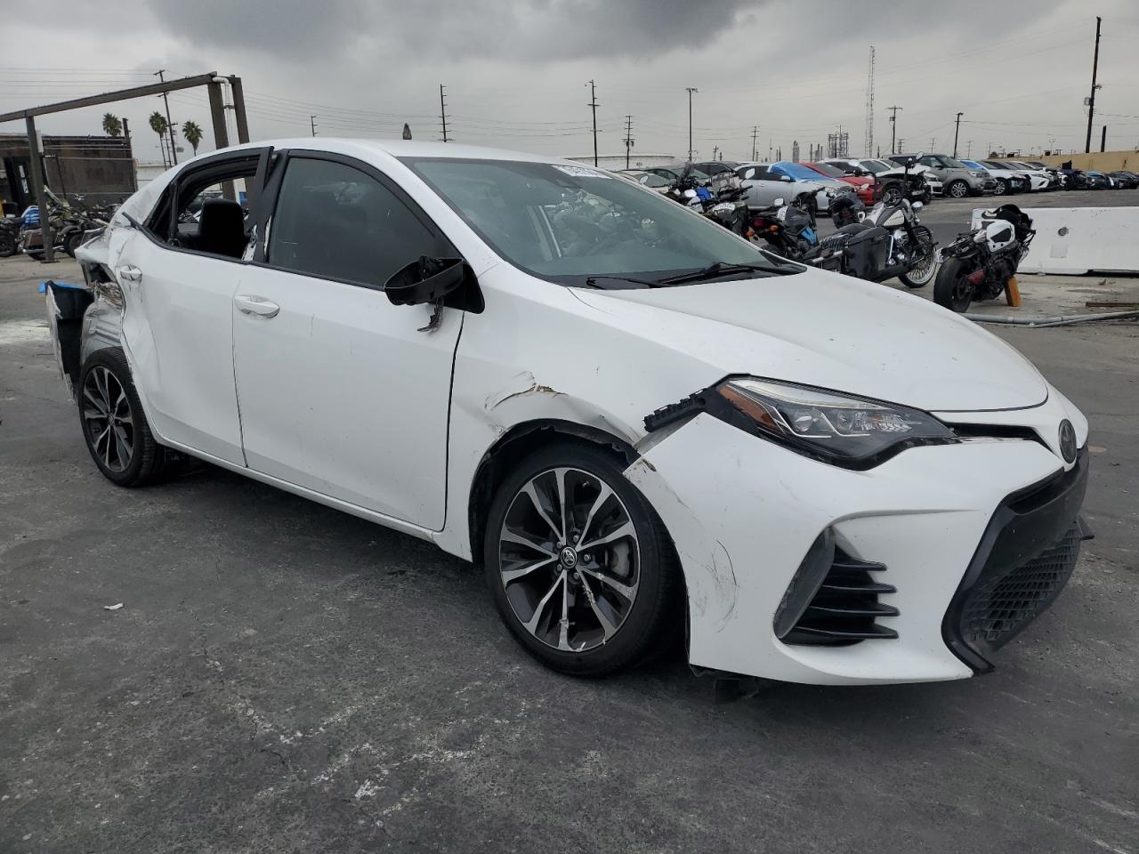 2019 Toyota Corolla VIN 5YFBURHE1KP878997 Copart auction photo, rear end / all over damage thumbnail 4