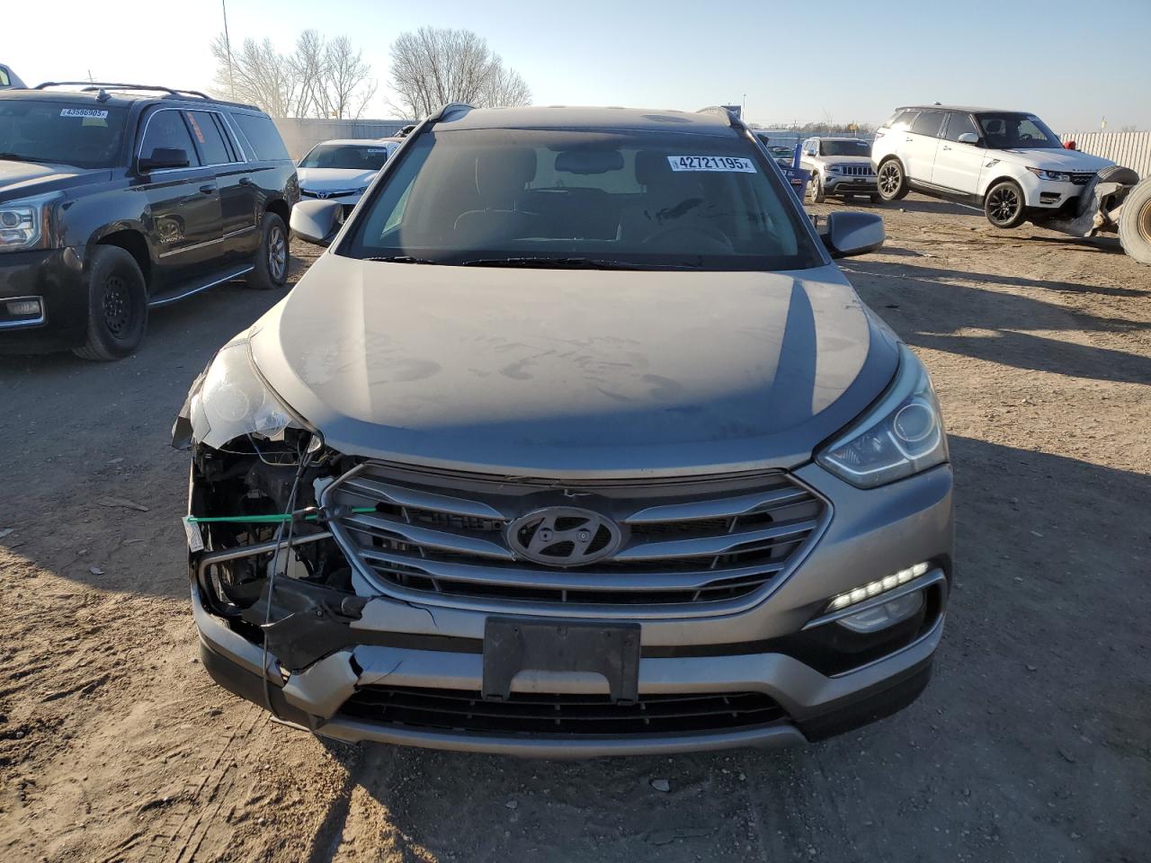 2017 Hyundai Santa Fe VIN 5XYZU3LB3HG413028 Copart auction photo, front end damage thumbnail 5