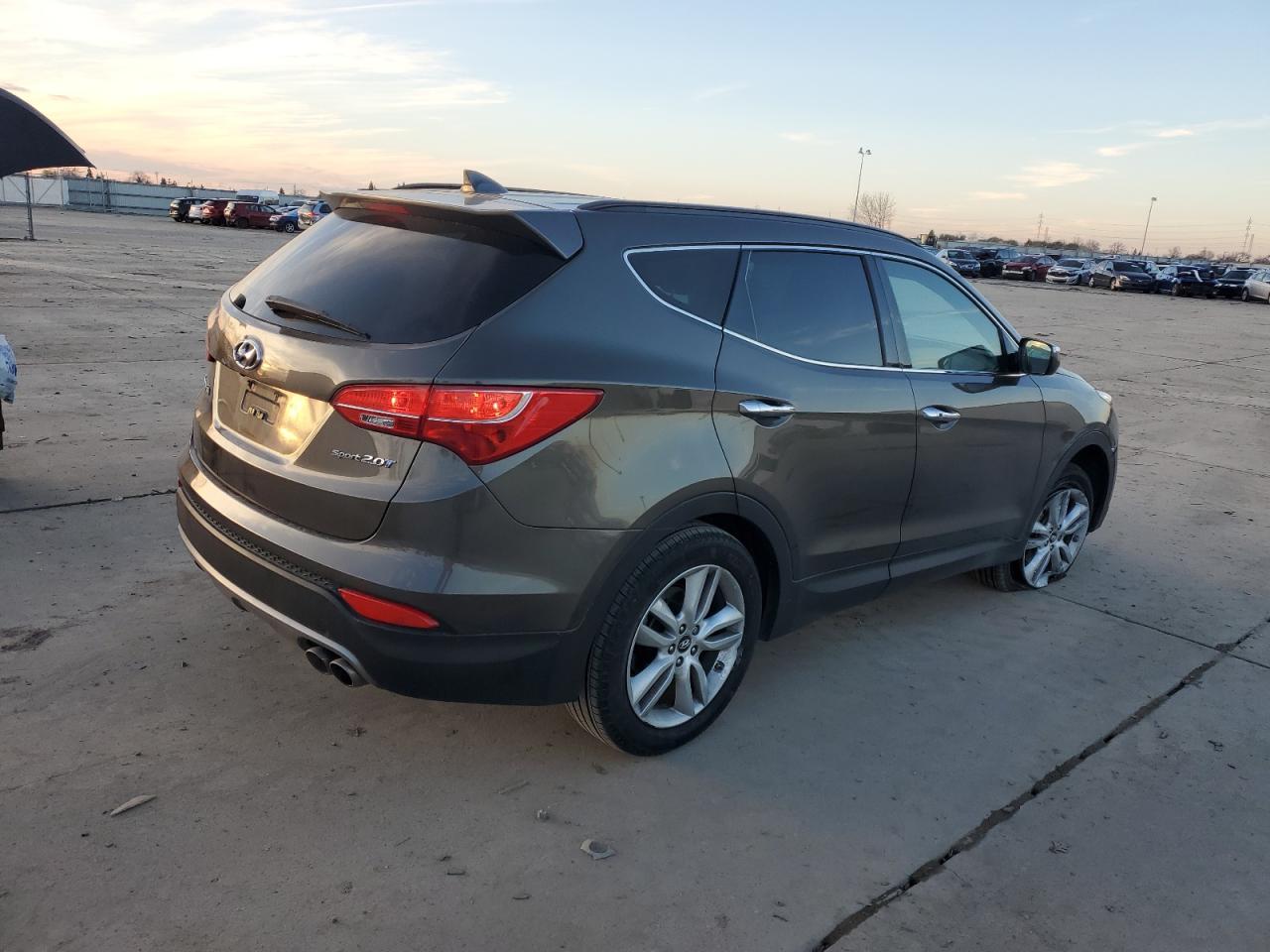 2014 Hyundai Santa Fe VIN 5XYZU3LA0EG180020 Copart auction photo, front end damage thumbnail 3