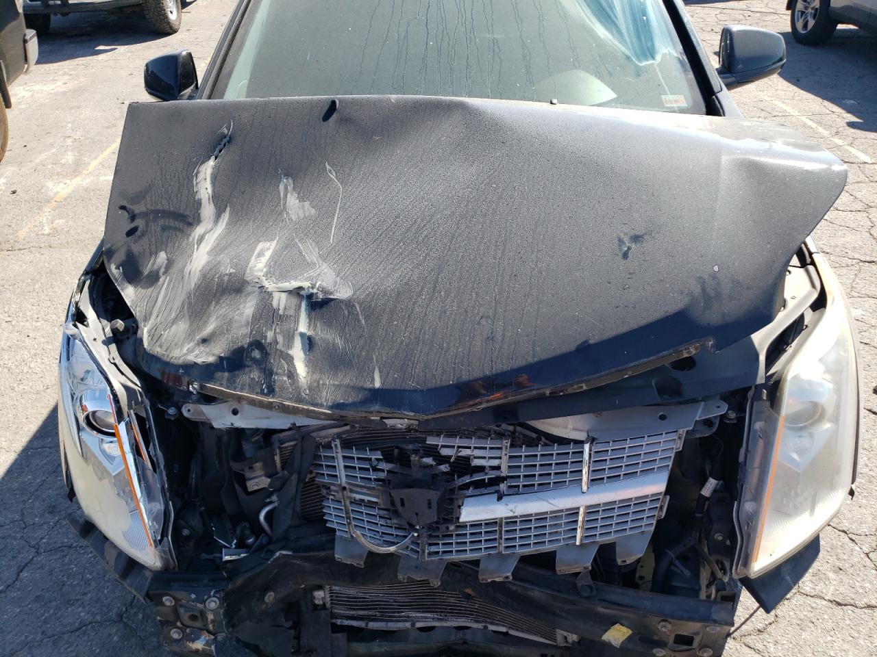 2012 Cadillac SRX VIN 3GYFNCE34CS573653 Copart auction photo, front end damage thumbnail 12