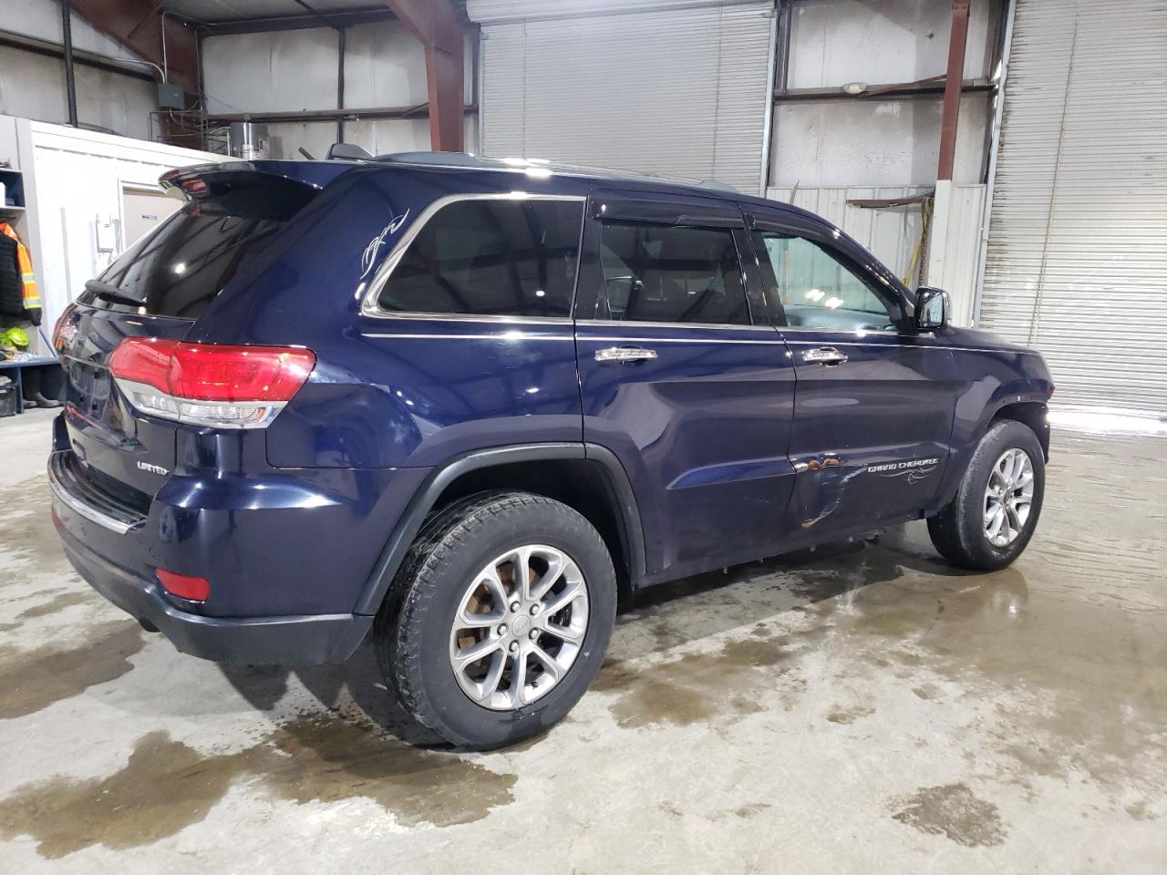 2015 Jeep Grand Cherokee VIN 1C4RJFBG4FC846737 Copart auction photo, front end / side damage thumbnail 3