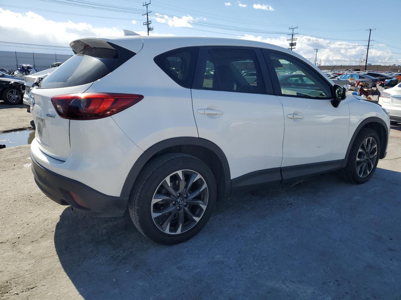 2016 Mazda CX-5 VIN JM3KE2DY2G0881372 Copart auction photo, front end damage thumbnail 3