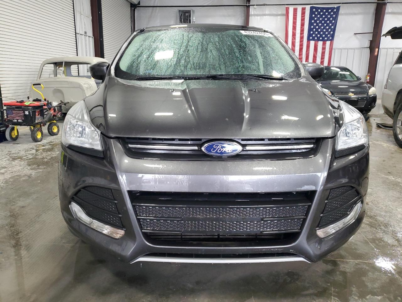 2015 Ford Escape VIN 1FMCU0G95FUB06205 Copart auction photo, side damage thumbnail 5