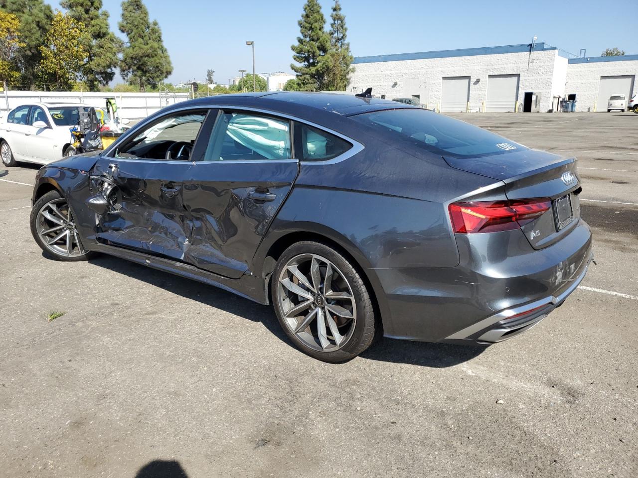 2023 Audi A5 VIN WAUFACF59PA060341 Copart auction photo, side / rear end damage thumbnail 2
