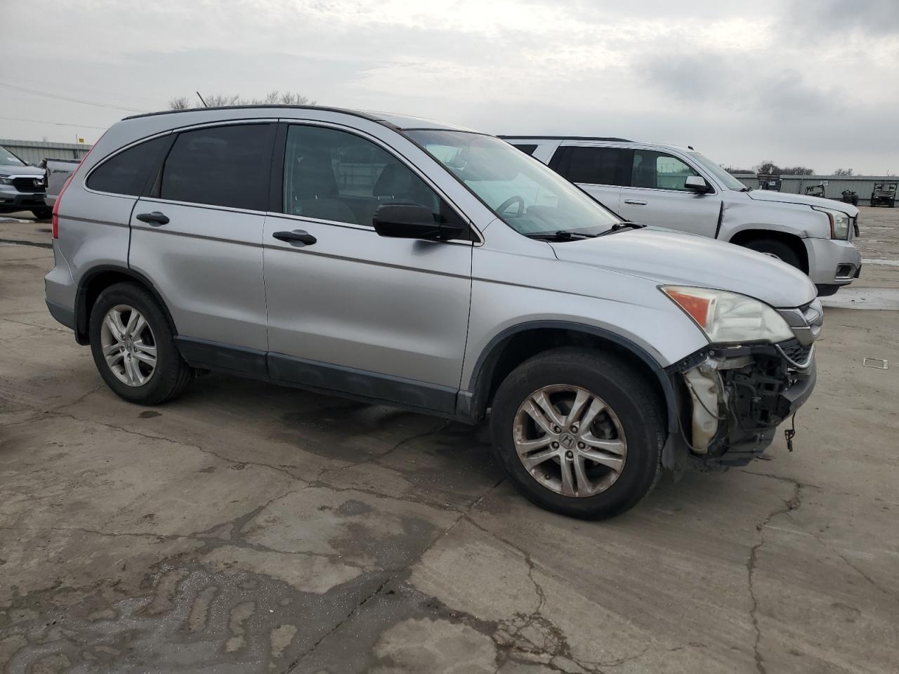 2010 Honda CR-V VIN 3CZRE3H56AG702874 Copart auction photo, front end / hail damage thumbnail 4