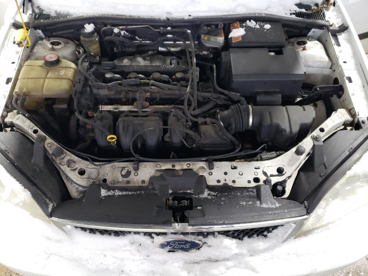 2005 Ford Focus VIN 1FAFP34N15W119747 Copart auction photo, undercarriage / minor dent/scratches damage thumbnail 11