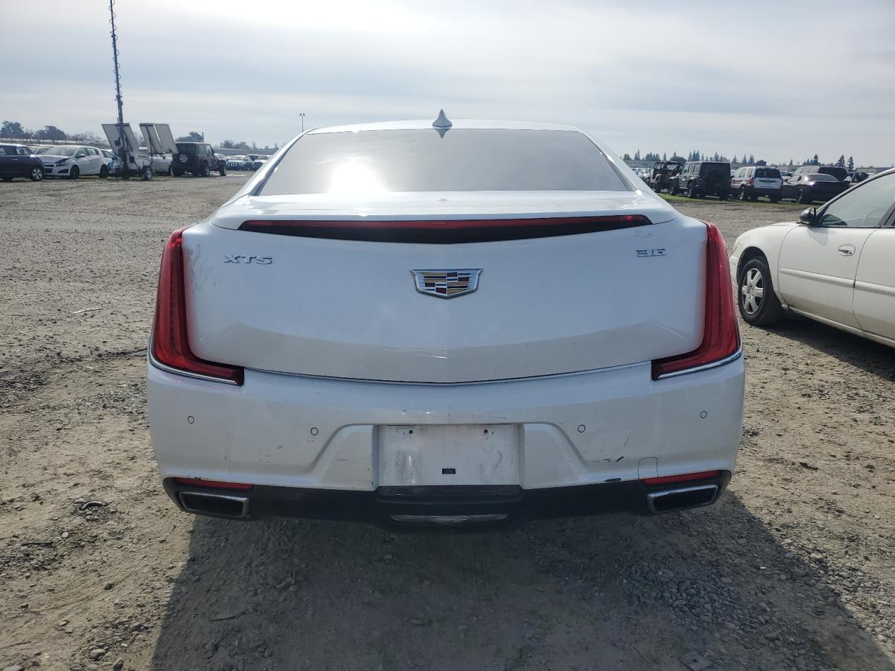 2019 Cadillac XTS VIN 2G61M5S3XK9119389 Copart auction photo, front end / rear end damage thumbnail 6