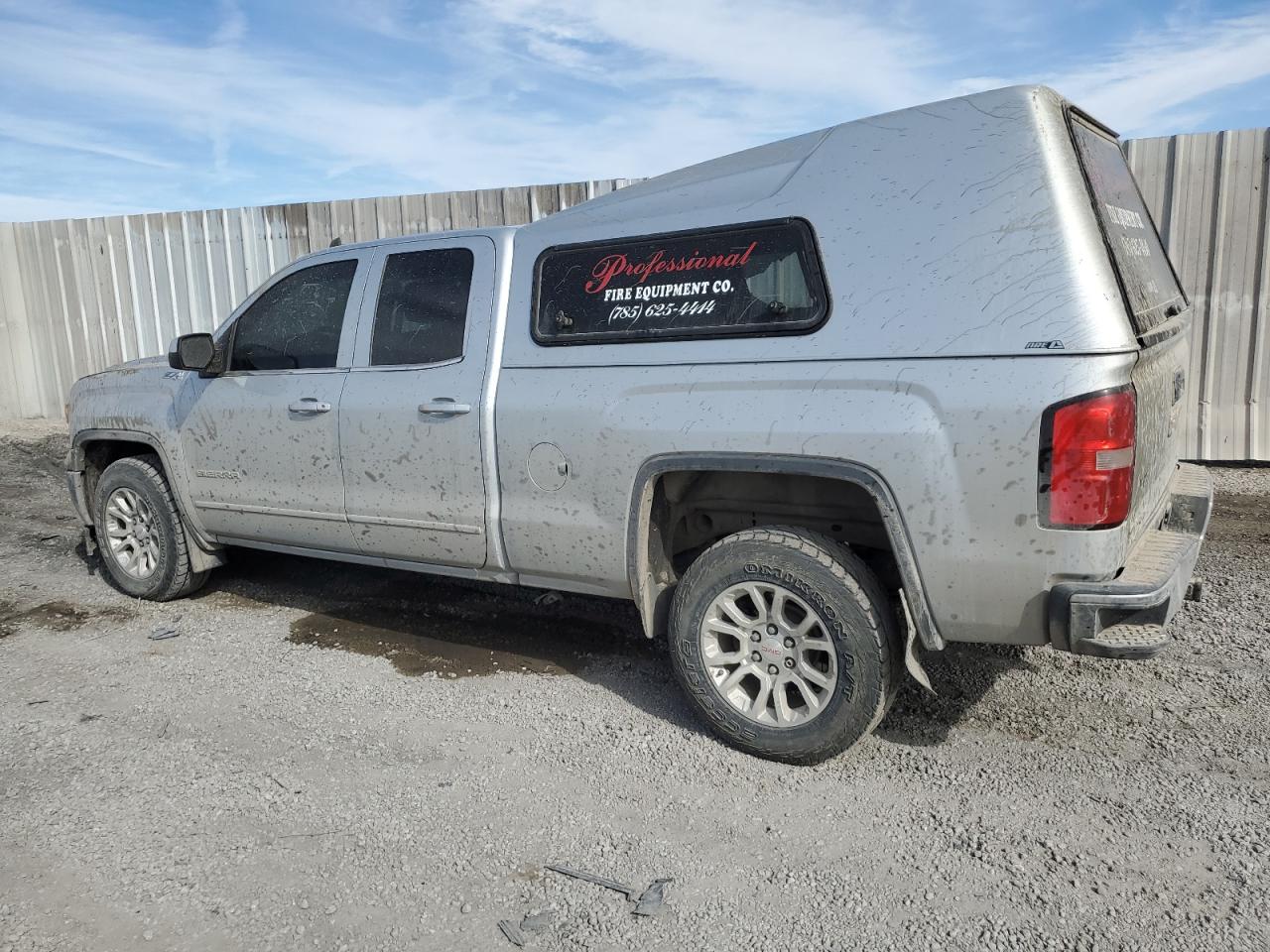 2015 GMC Sierra VIN 1GTV2UEC0FZ149619 Copart auction photo, side / mechanical damage thumbnail 2