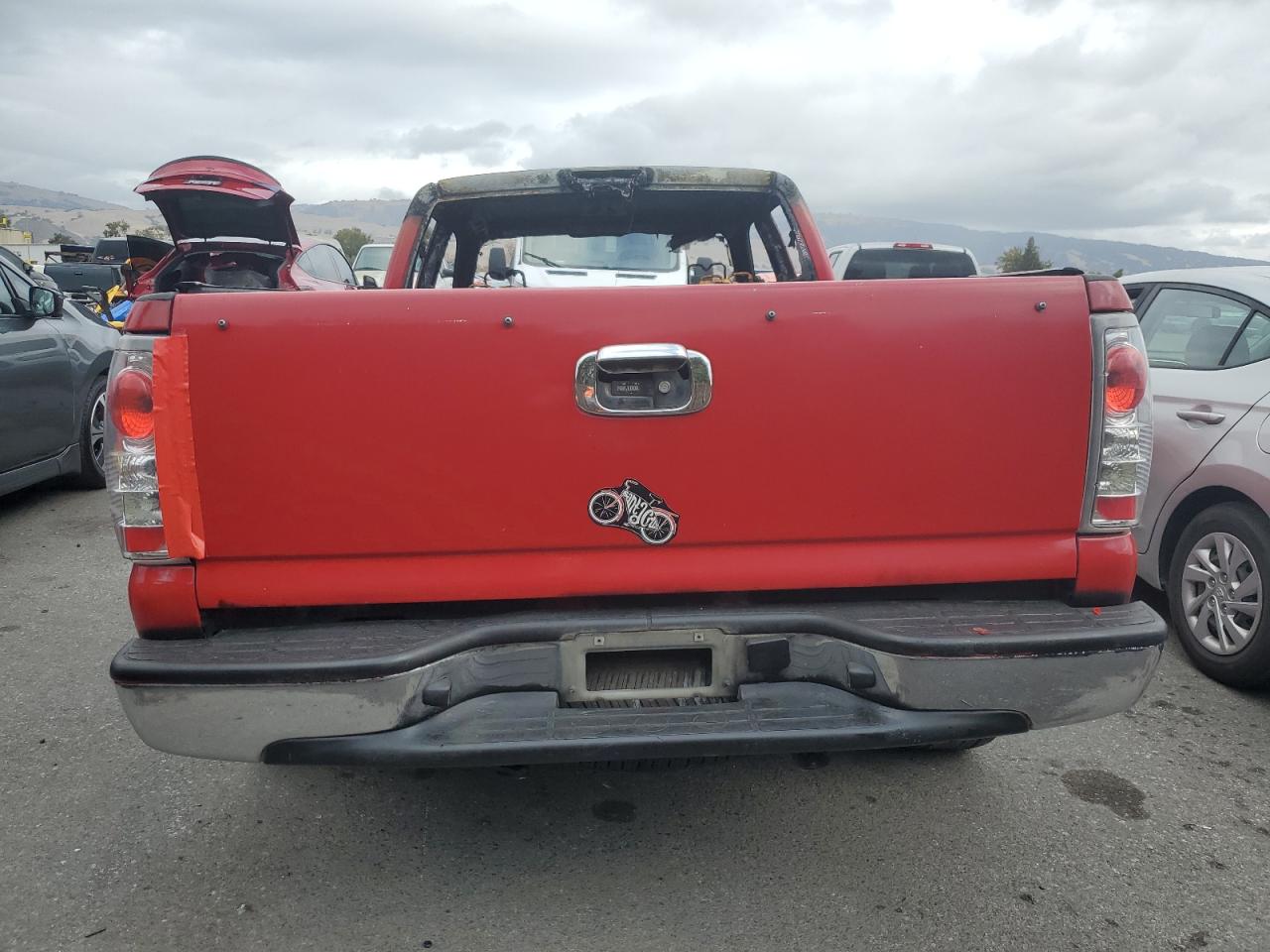 2005 Chevrolet Silverado VIN 1GCEC19XX5Z228724 Copart auction photo, burn damage thumbnail 6