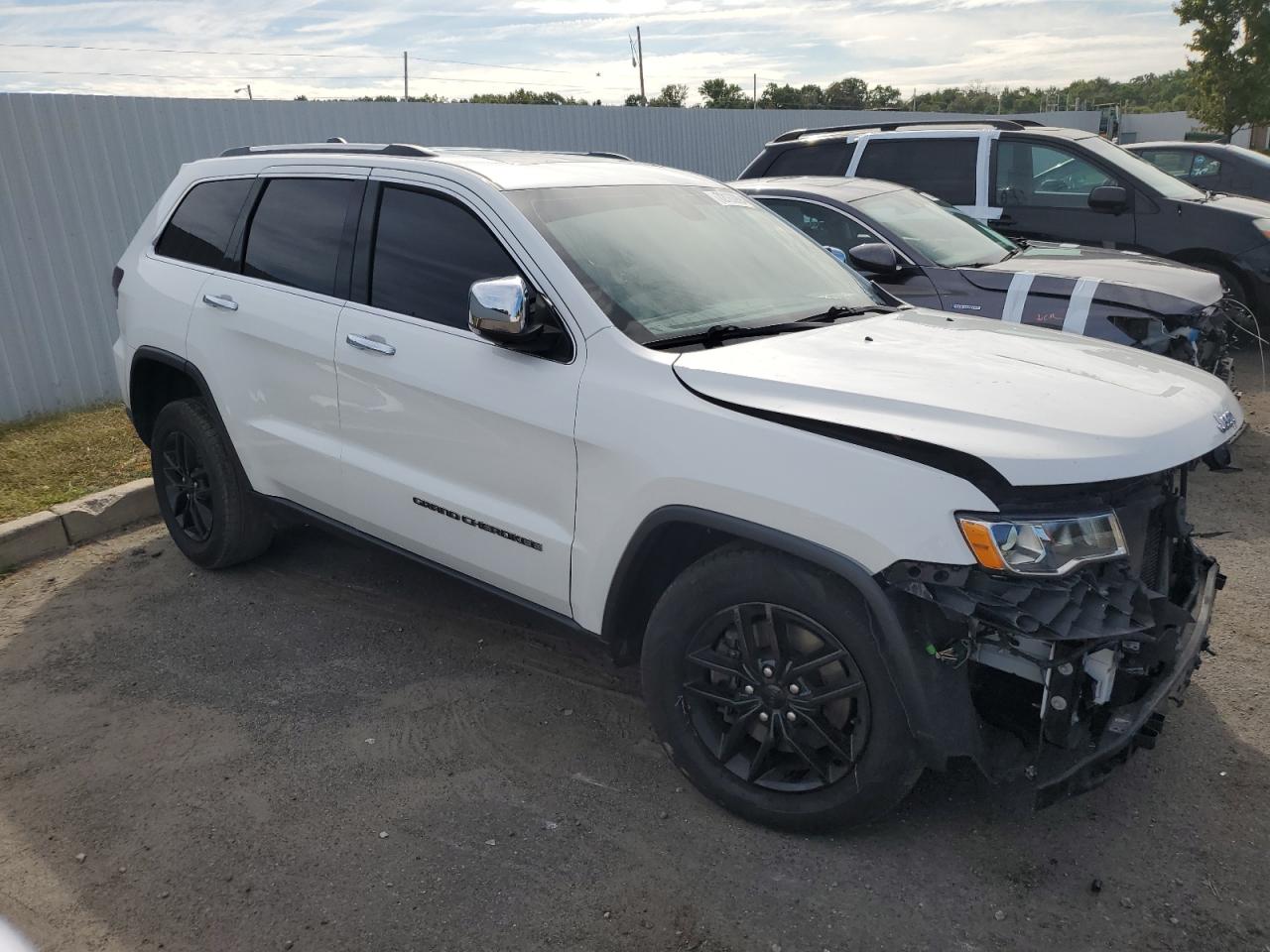 2021 Jeep Grand Cherokee VIN 1C4RJFBG7MC824440 Copart auction photo, front end / side damage thumbnail 4