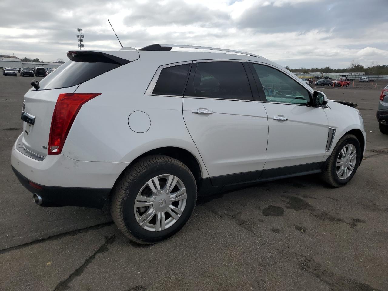 2015 Cadillac SRX VIN 3GYFNEE36FS628541 Copart auction photo, front end / minor dent/scratches damage thumbnail 3