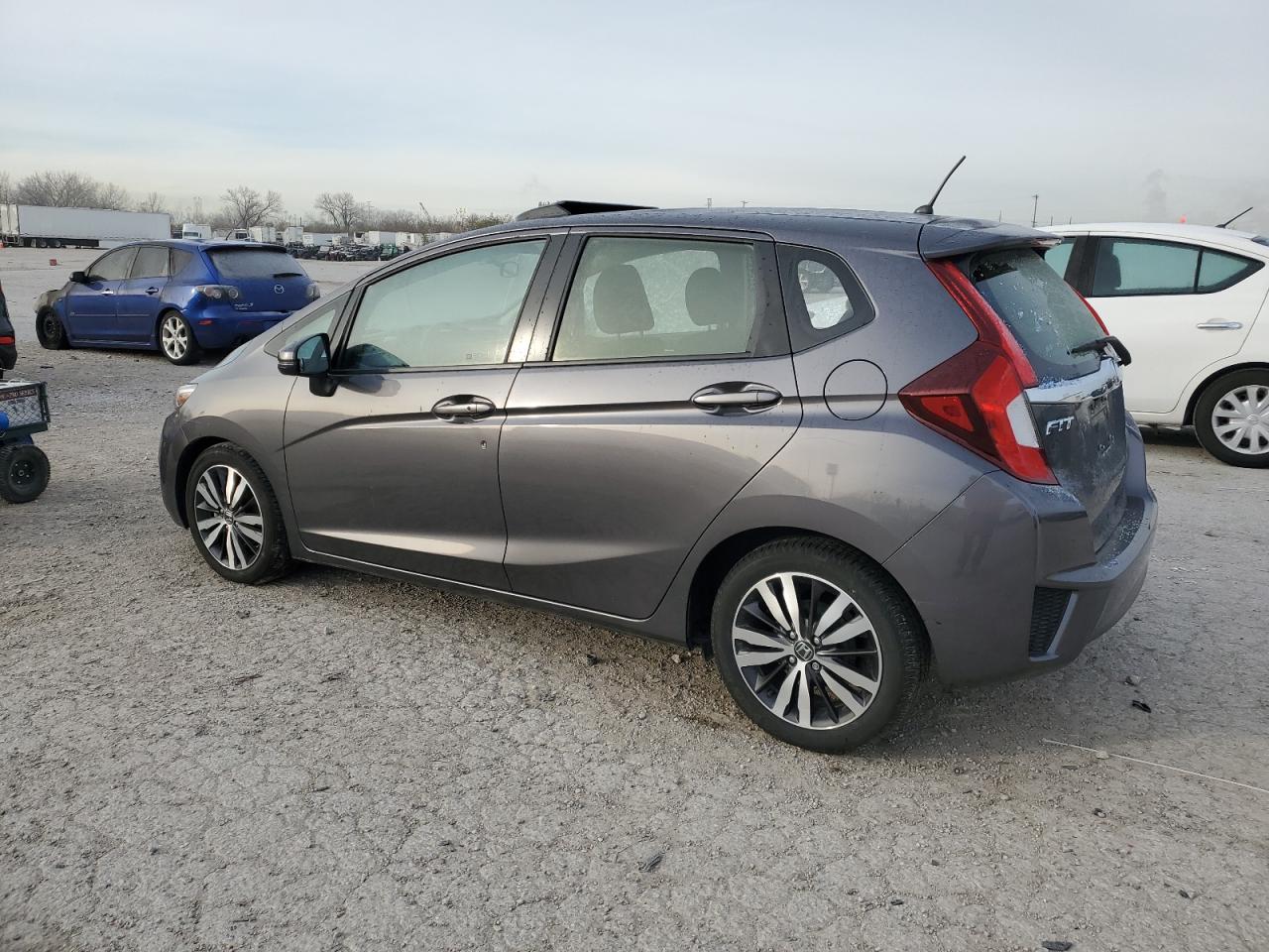 2016 Honda Fit VIN JHMGK5H7XGS011690 Copart auction photo, side / rear end damage thumbnail 2