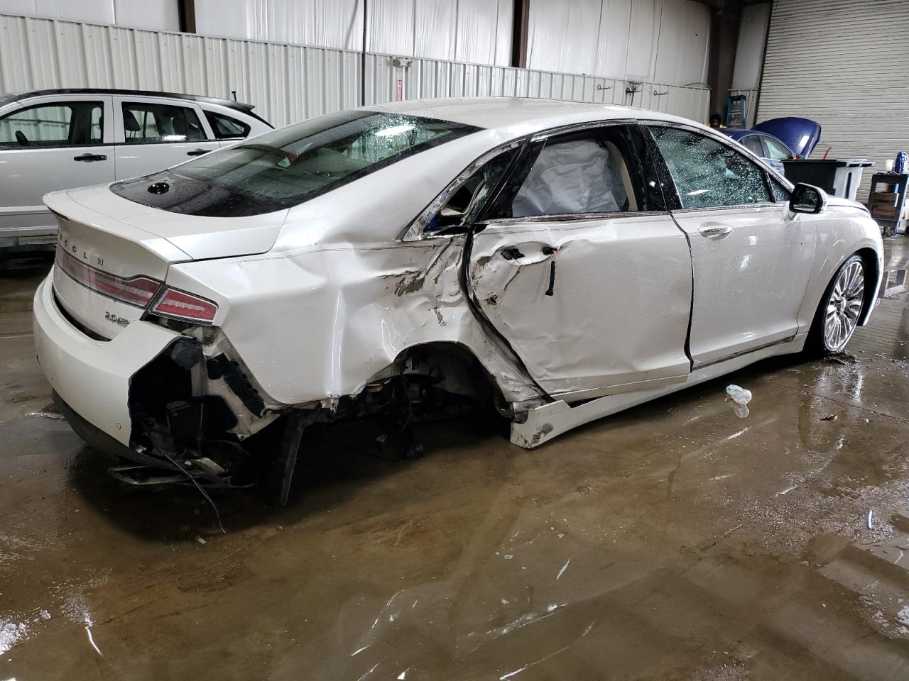 2016 Lincoln MKZ VIN 3LN6L2J93GR609132 Copart auction photo, side / rear end damage thumbnail 3