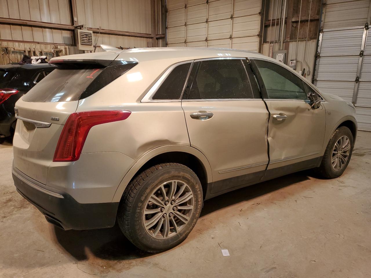 2017 Cadillac XT5 VIN 1GYKNBRSXHZ108783 Copart auction photo, side / minor dent/scratches damage thumbnail 3