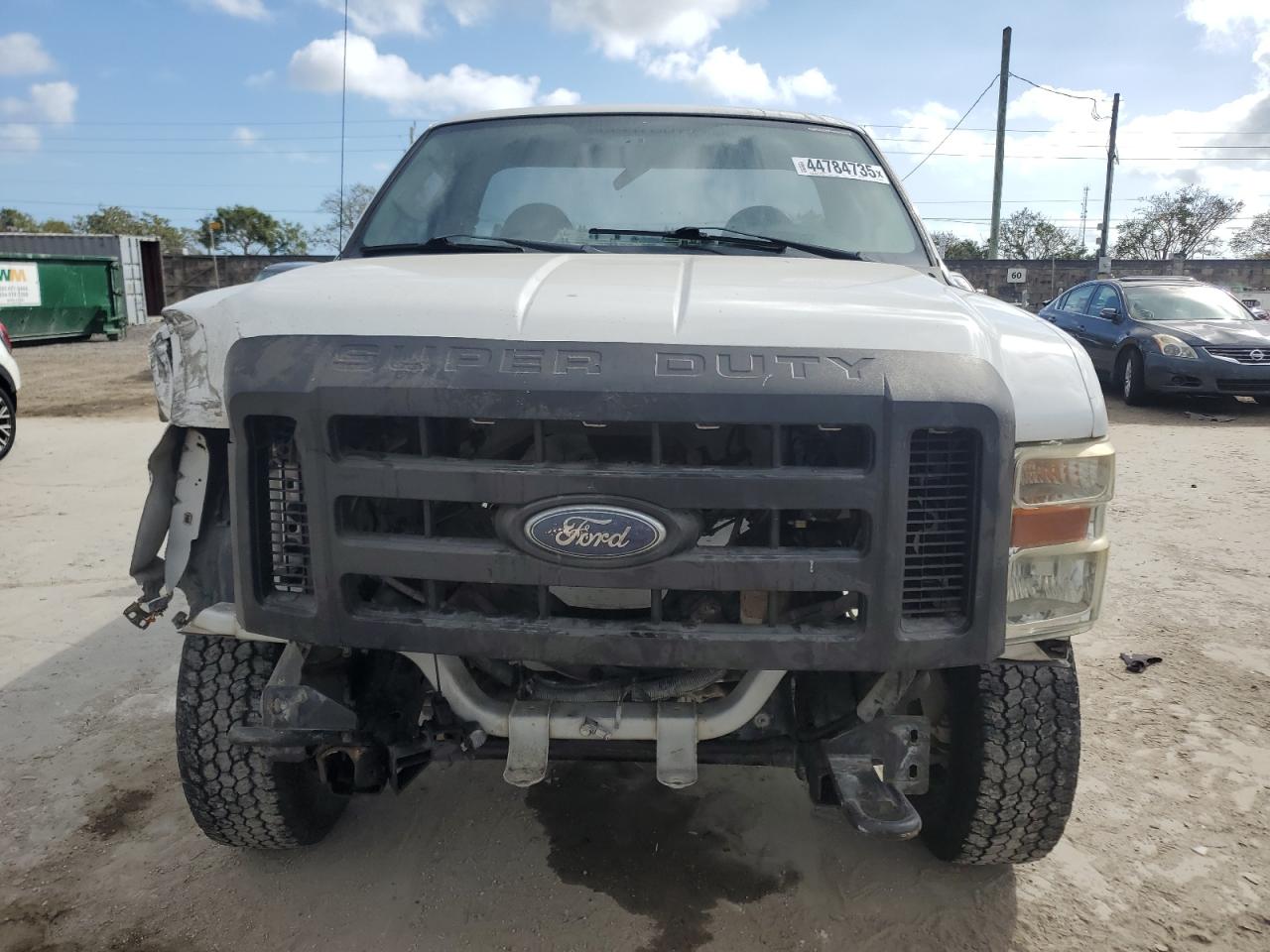 2009 Ford F250 VIN 1FTNF21509EA40914 Copart auction photo, front end / stripped damage thumbnail 5