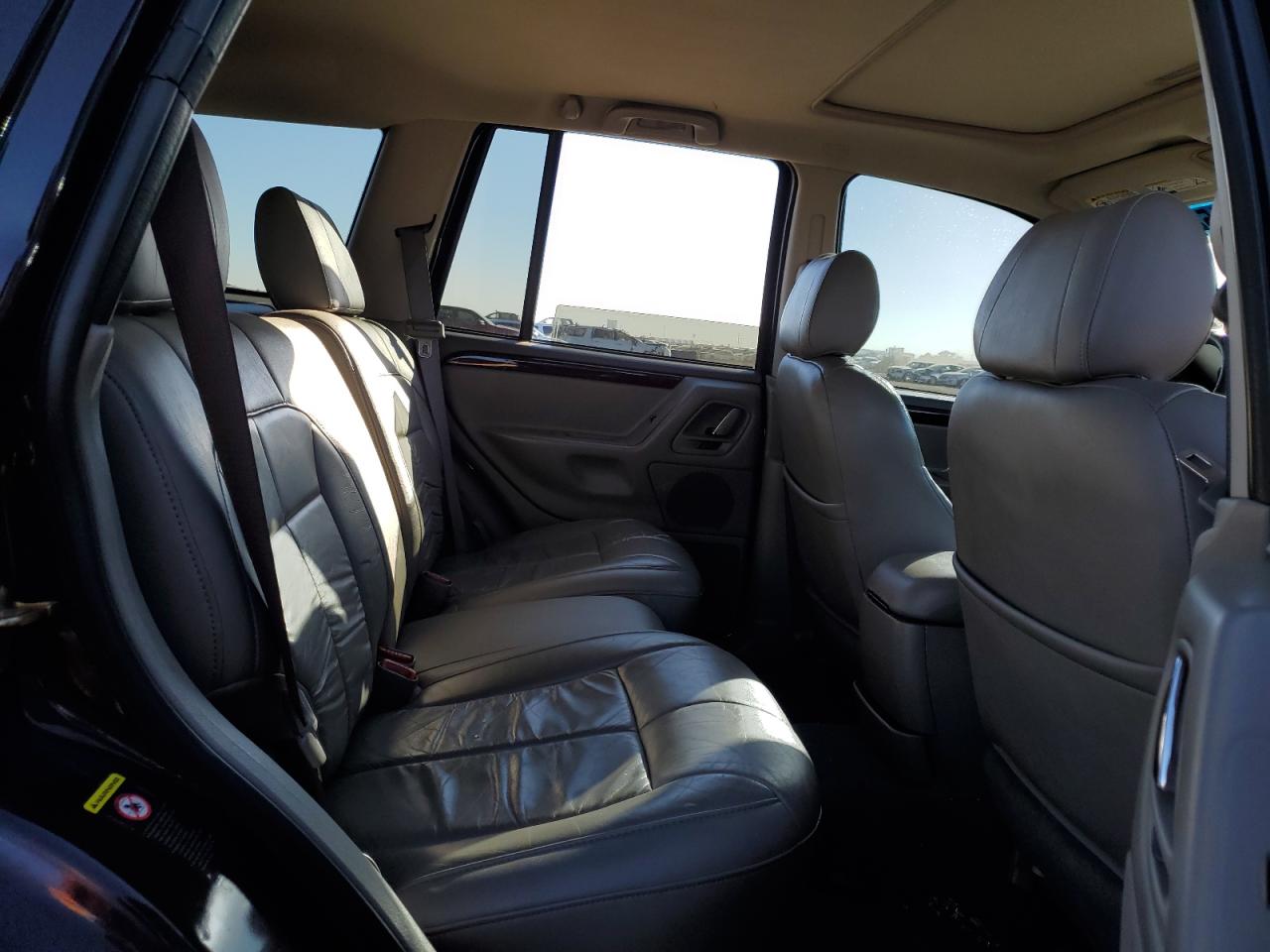 2004 Jeep Grand Cherokee VIN 1J8GW58N44C138146 Copart auction photo, all over damage thumbnail 11