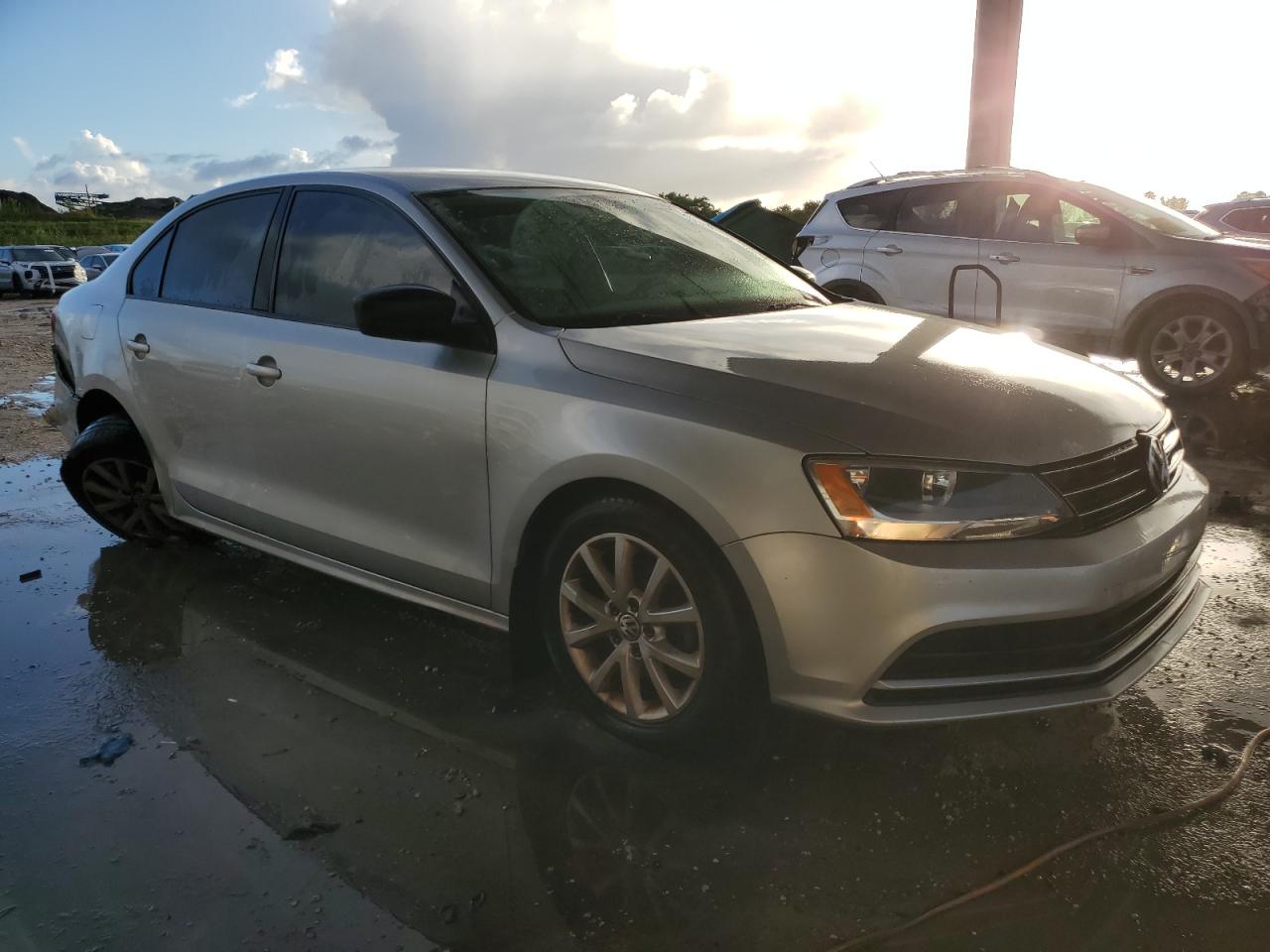 2015 Volkswagen Jetta VIN 3VWD17AJ5FM409452 Copart auction photo, rear end / minor dent/scratches damage thumbnail 4