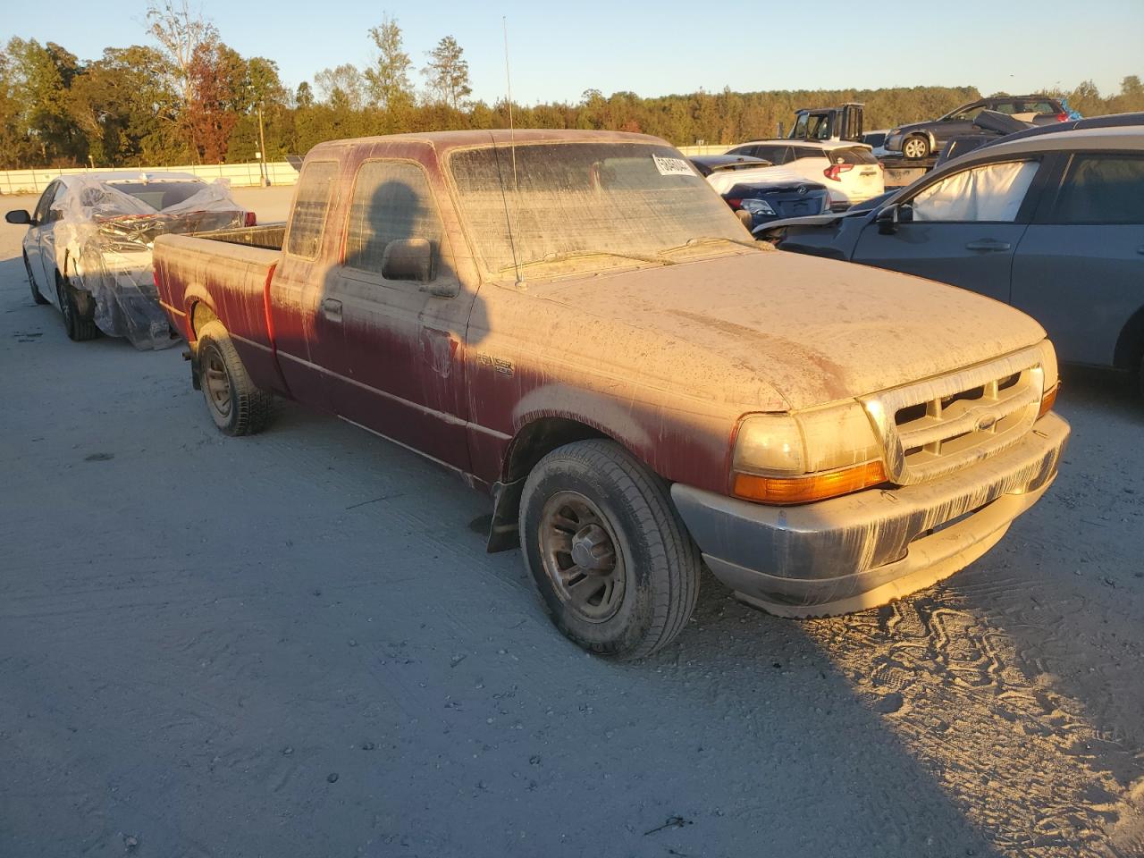 1999 Ford Ranger VIN 1FTYR14V6XTA65562 Copart auction photo, water/flood damage thumbnail 4