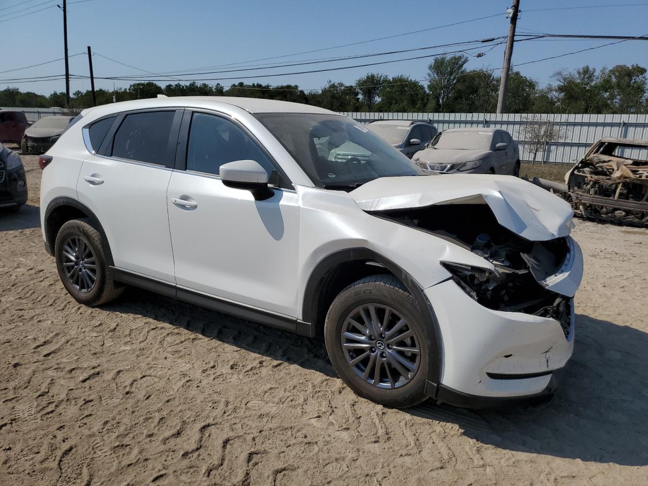 2020 Mazda CX-5 VIN JM3KFACM3L0845982 Copart auction photo, front end / minor dent/scratches damage thumbnail 4