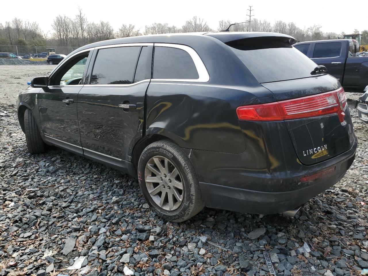 2014 Lincoln MKT VIN 2LMHJ5NK6EBL55820 Copart auction photo, side damage thumbnail 2