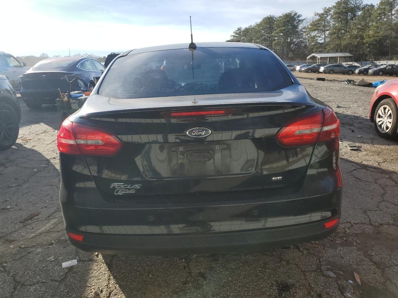 2016 Ford Focus VIN 1FADP3F22GL385115 Copart auction photo, front end / side damage thumbnail 6