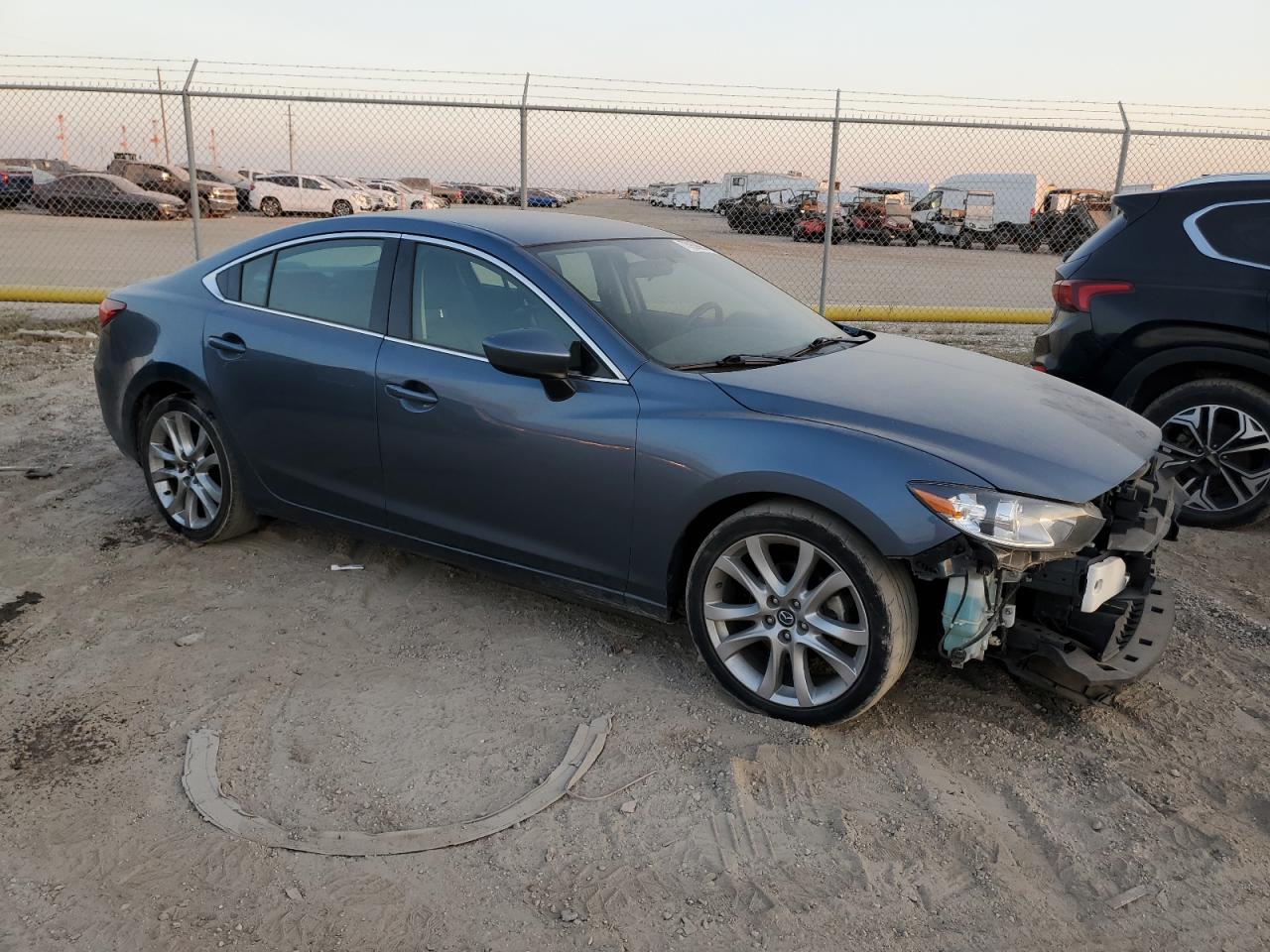 2015 Mazda 6 VIN JM1GJ1V51F1194885 Copart auction photo, front end / minor dent/scratches damage thumbnail 4