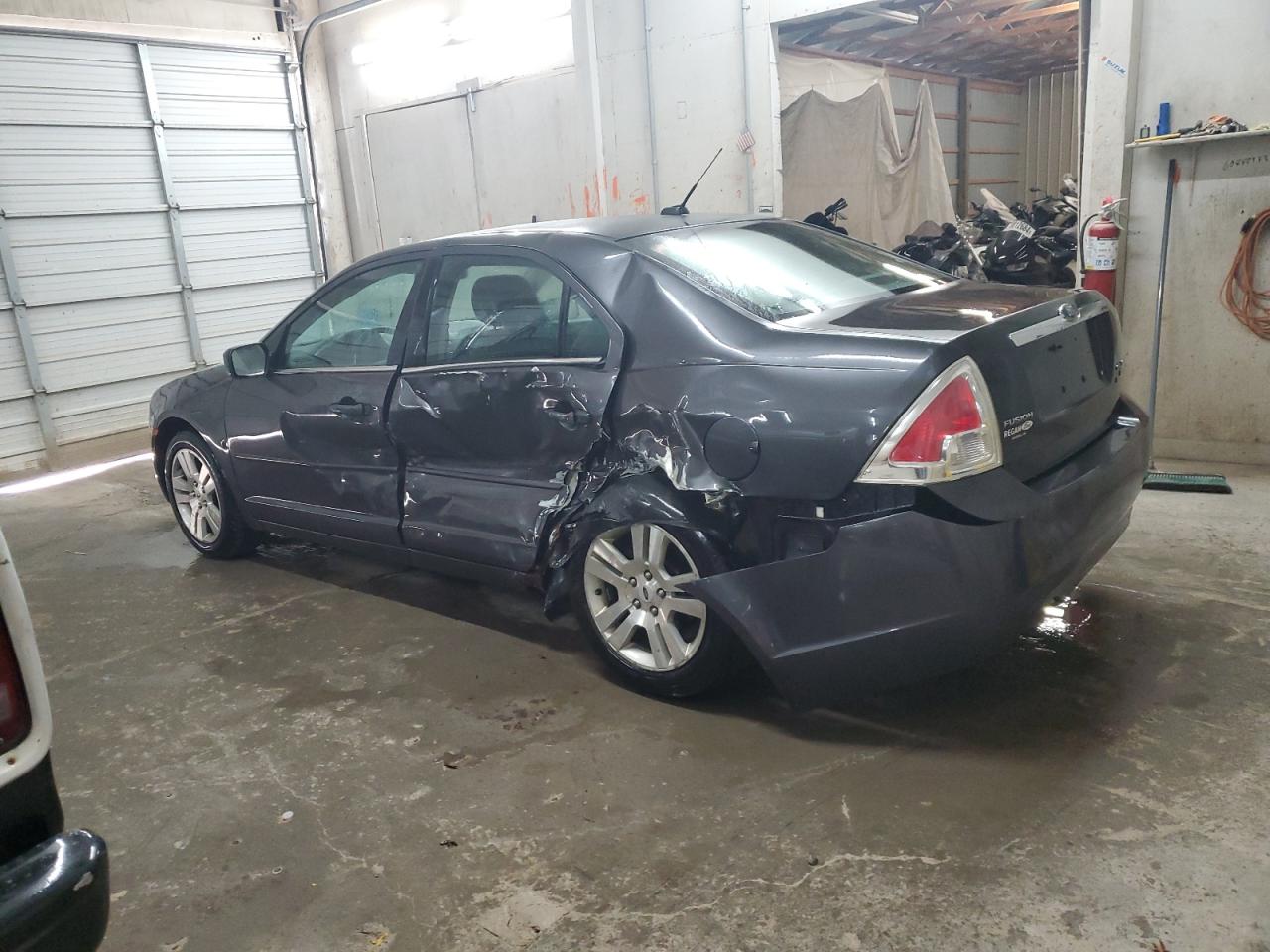 2007 Ford Fusion VIN 3FAHP02197R183094 Copart auction photo, side / rear end damage thumbnail 2