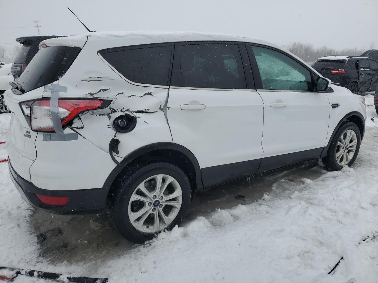 2017 Ford Escape VIN 1FMCU9G9XHUC89155 Copart auction photo, side / rear end damage thumbnail 3