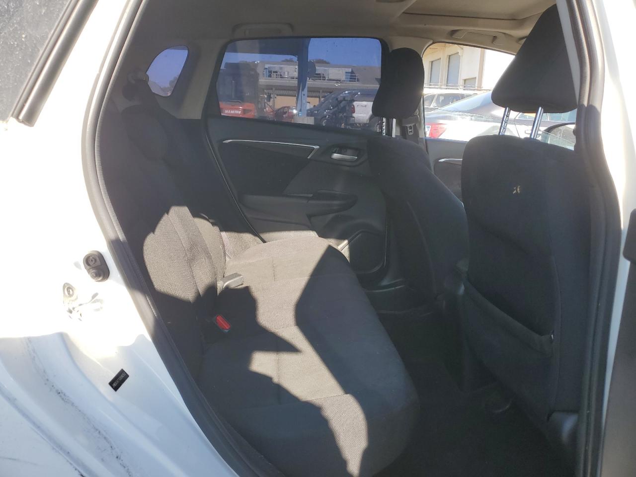 2016 Honda Fit VIN JHMGK5H77GX046352 Copart auction photo, side / front end damage thumbnail 10